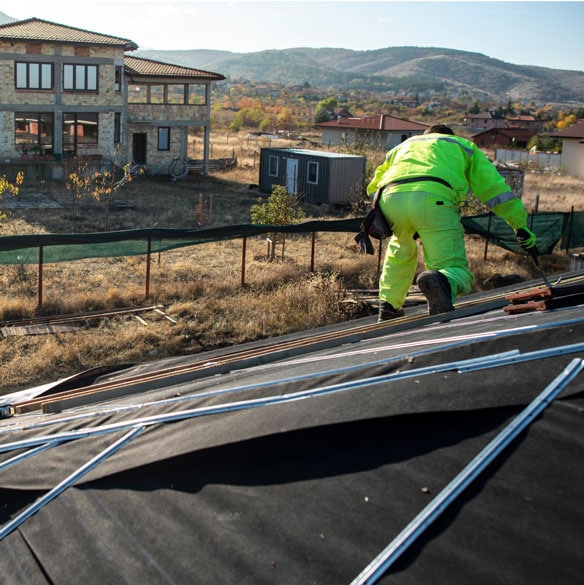 Man Fixing Roof